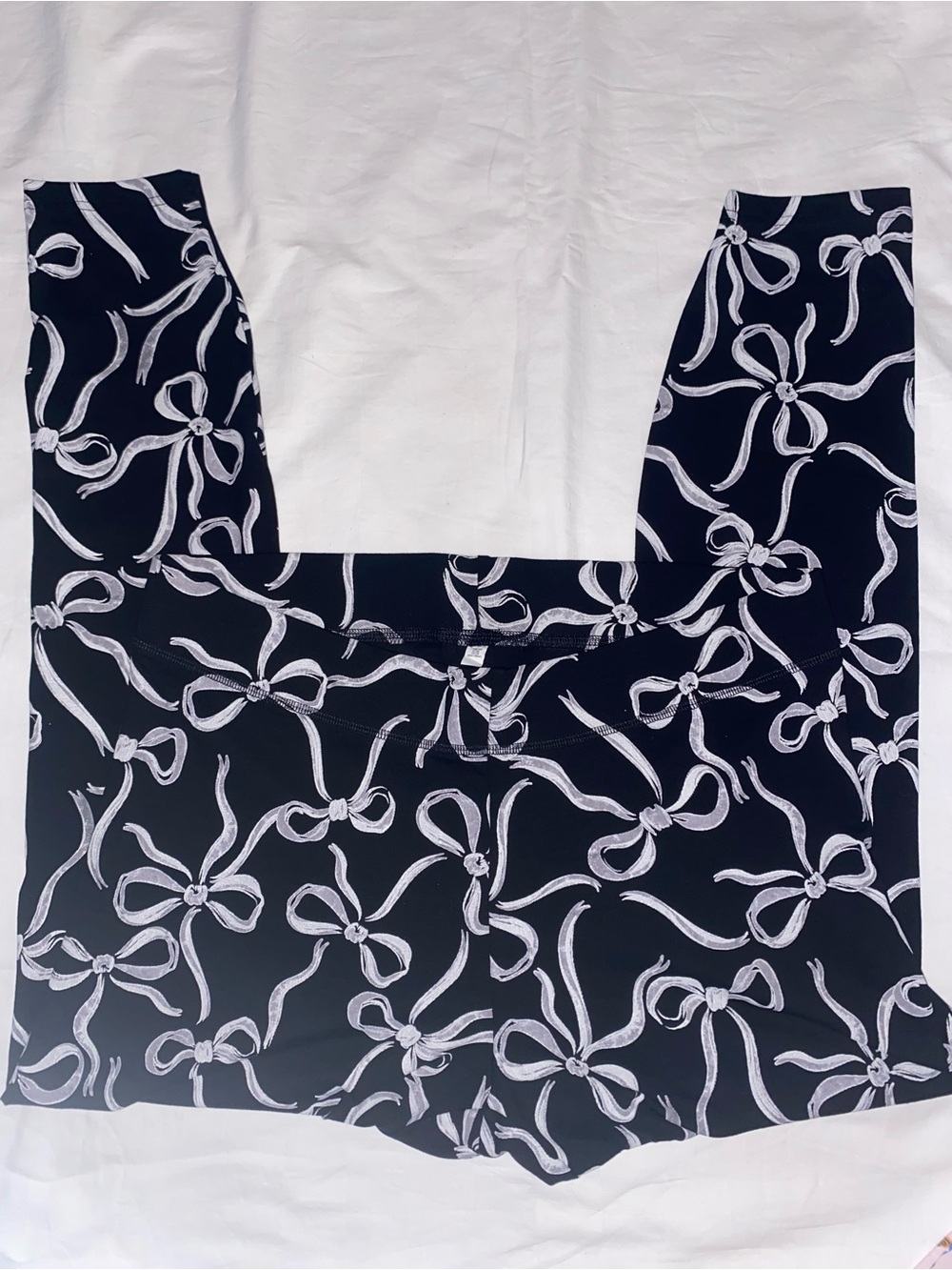 Lane Bryant Black Leggings with White Bow Print- never worn
